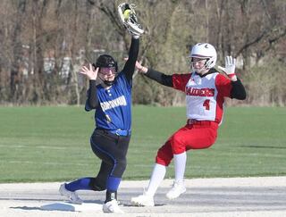 Somonauk's Kayla Anderson makes a catch at second base to force out Earlville's Kiley Franzese on Friday, April 12, 2024 at Earlville High School.