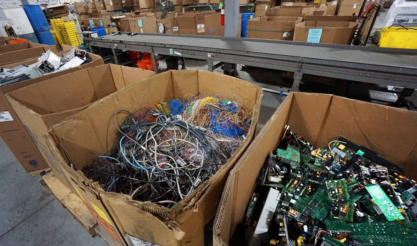 Items wait to be processed at Elgin Recycling's 65,000-square-foot electronics recycling warehouse in West Dundee.