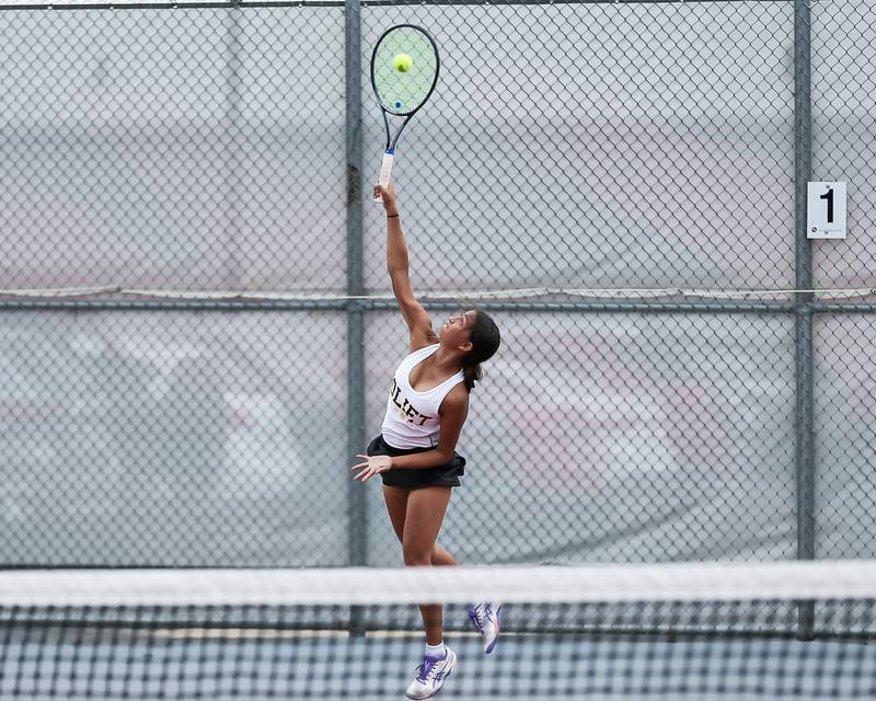 Joliet West's Sophia Baltz serves in her match at the Plainfield North Girls Tennis Invite.  Oct 4th, 2023.