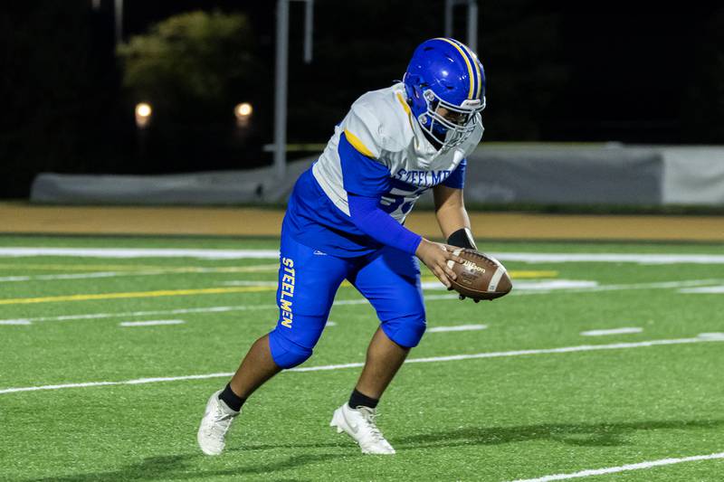 Joliet Central's Andres Leon prepares to punt during a varsity football game against Joliet West at Joliet West on Oct. 24, 2025.