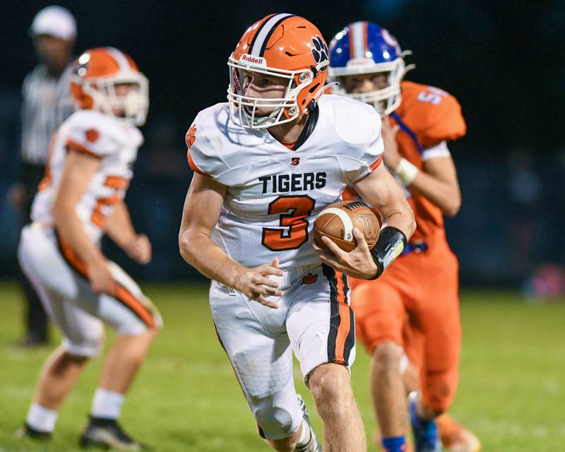 Byron Branden Smith breaks away from Genoa-Kingston defenders and scores on a long play during the first quarter Friday Sep. 16th while at Genoa-Kingston.