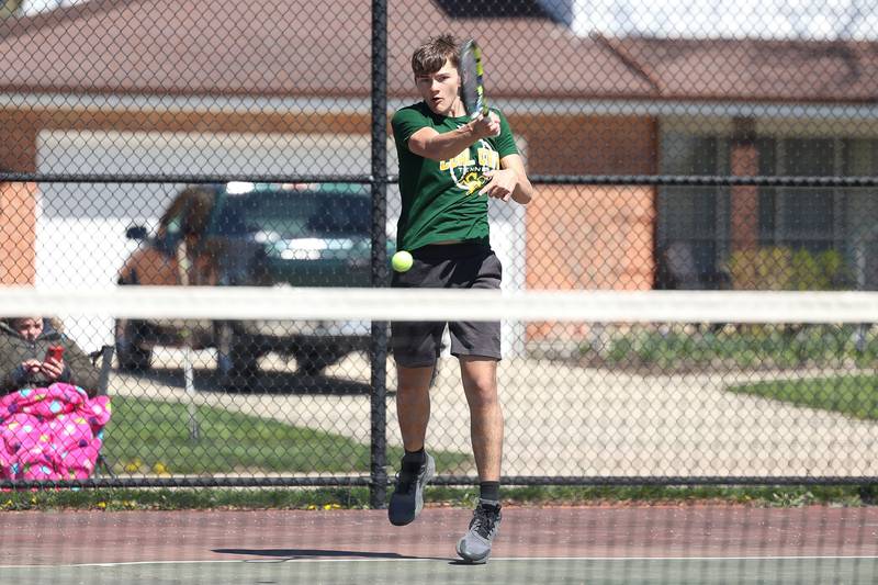 Coal City’s Martin Ramirez returns a shot against Plainfield South’s Nick Chance on Saturday, April 6, 2024 in Joliet.