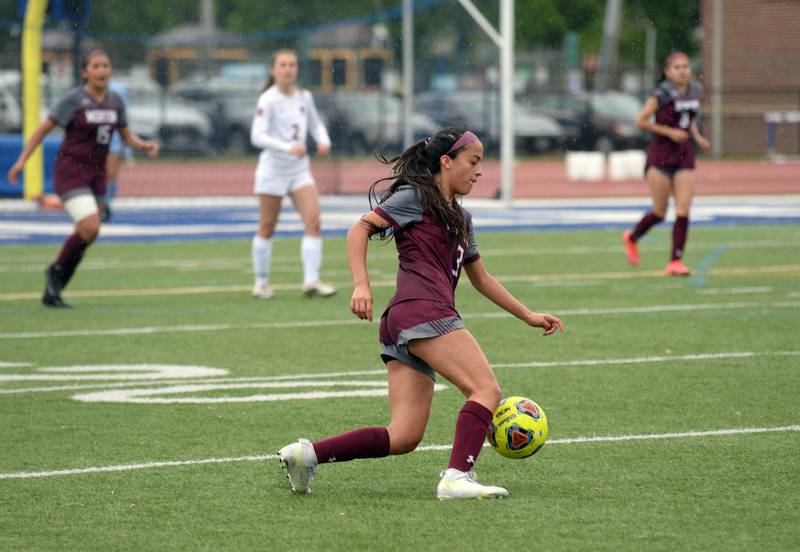 Morton West's Stephanie Salmeron  defends the ball against Hinsdale Central during the regional final game held Saturday May 21, 2022.