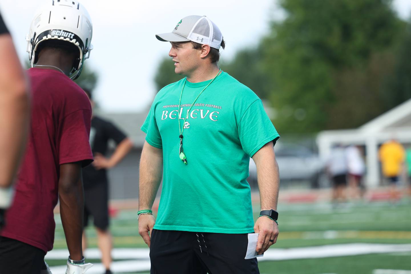 Providence head coach Tyler Plantz goes over instructions during the first day of practice on Monday, Aug. 7, 2023 in New Lenox.