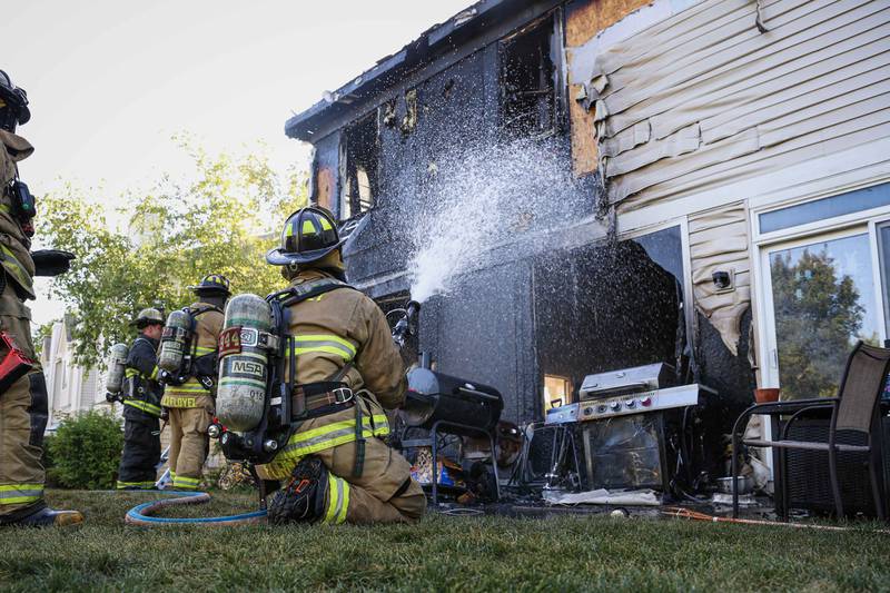 The Huntley Fire Protection District puts out a fire that broke out in a Lake in the Hills townhome that displaced a family on Aug. 13, 2025.