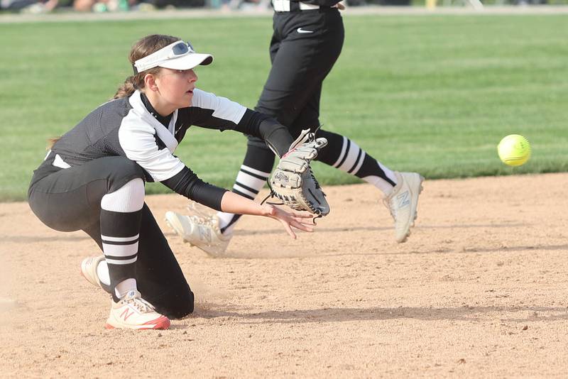 Kaneland's Gabriella Gonzales takes the throw on a steal attempt during their Class 3A Regional game against Woodstock Tuesday, May 24, 2022, at Kaneland High School in Maple Park.