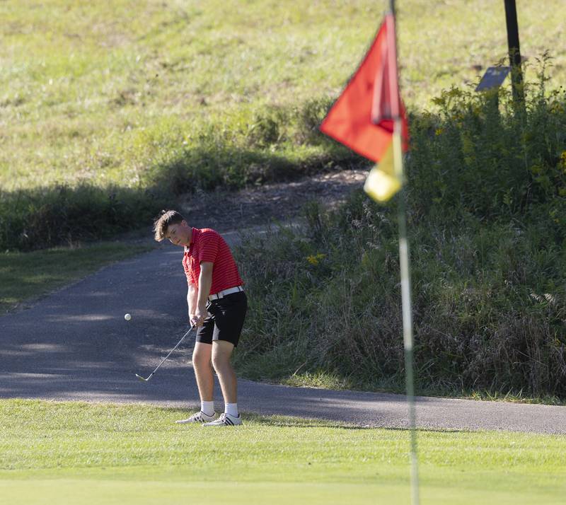 Oregon’s Landon Anderson chips to the green at #10 against Rock Falls Tuesday, Sept. 3, 2024, at Silver Ridge Golf Club in Oregon.