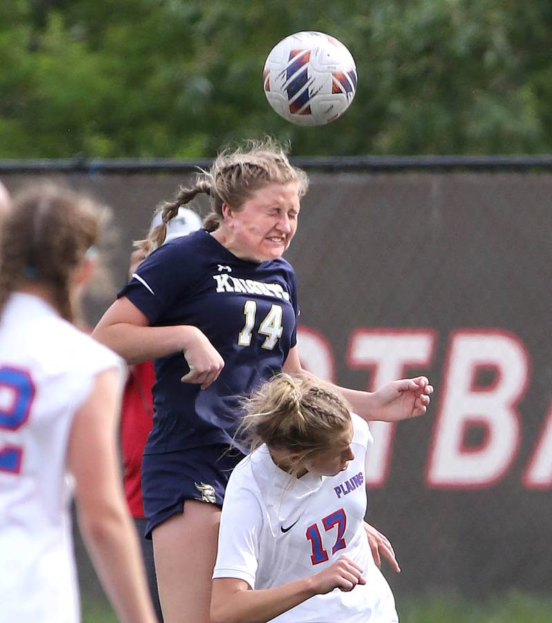IC Catholic Prep's Lucy Russ heads the ball over Pleasant Plains' Bailey Leach during the IHSA Class 1A state girls soccer third place game Saturday, May 27, 2023, at North Central College in Naperville.