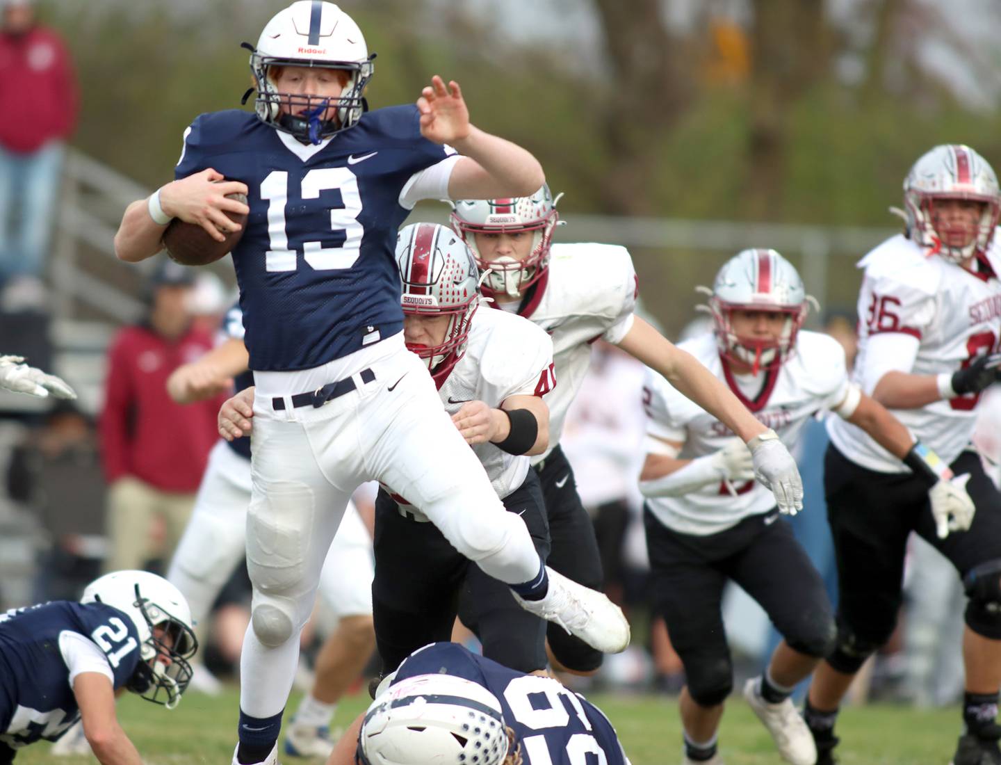 Cary-Grove’s Jackson Berndt scrambles for a first down against Antioch in IHSA Class 6A second-round playoff football action on Saturday, Nov. 9, 2024, at Al Bohrer Field on the campus of Cary-Grove High School in Cary..