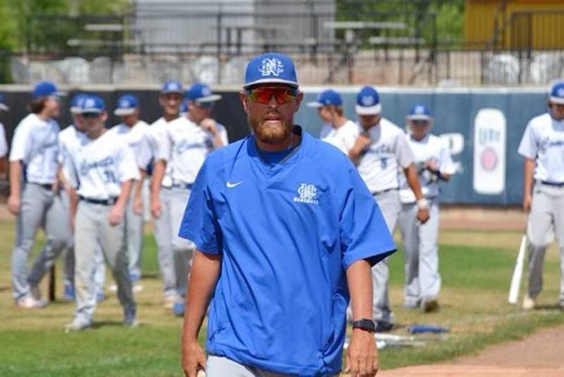 Newman coach Kenny Koerner walks off the field following a game this season.