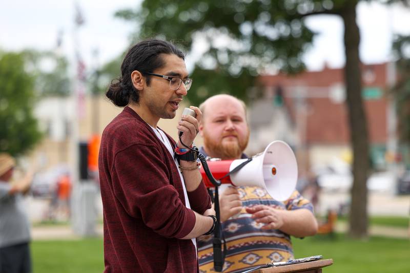 Brandon Hudspeth-Perales, an organizer with Indivisible Kankakee, speaks to the approximately 500 people gathered at the Kankakee County Courthouse for a ‘No Kings’ rally in Kankakee on Saturday, June 14, 2025, to protest actions by President Donald Trump.