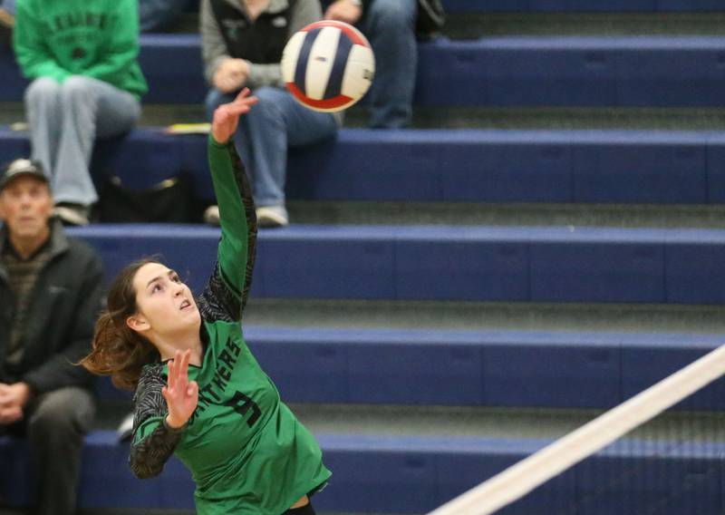 Leland's Ava Winckler spikes the ball to Earlville during the Class 1A Regional semifinals on Monday, Oct. 27, 2025 at Somonauk High School.