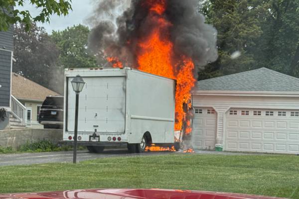 Cab burns delivery truck Friday in Woodstock; nearby garage, house spared