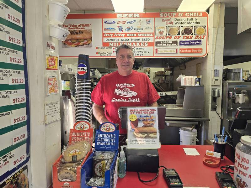 Tim Reilly, owner of Babe's Hot Dogs in Joliet, which he founded 37 years ago at the age of 25, is seen at the helm of his restaurant early on Tuesday, Dec. 9, 2025. Reilly has listed his business, which many consider a staple in the community, for sale.