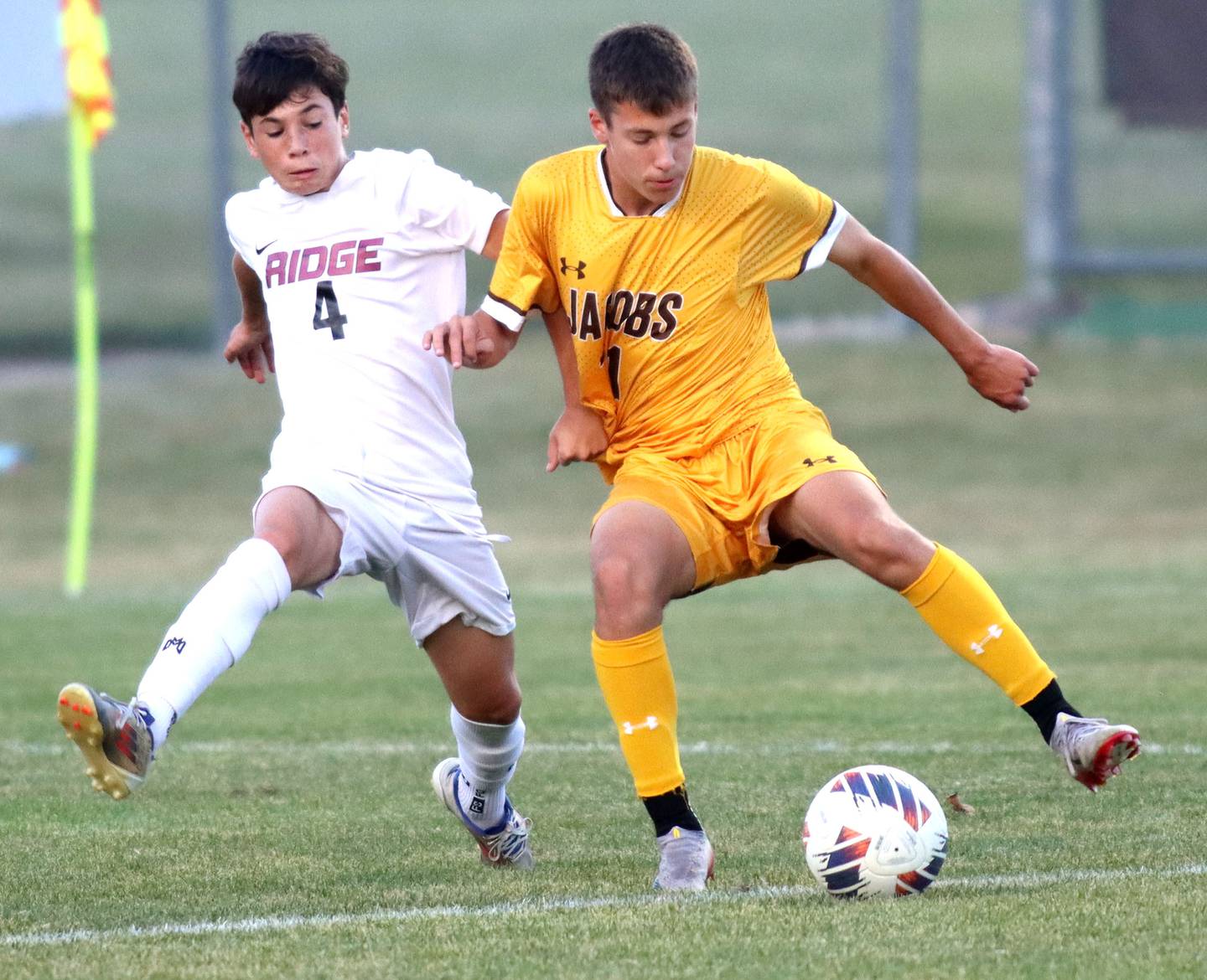Jacobs’ Ethan Aldrete , right, battles Prairie Ridge’s Anthony Rust in varsity soccer at Jacobs High School in Algonquin on Thursday, Sept. 18, 2025.