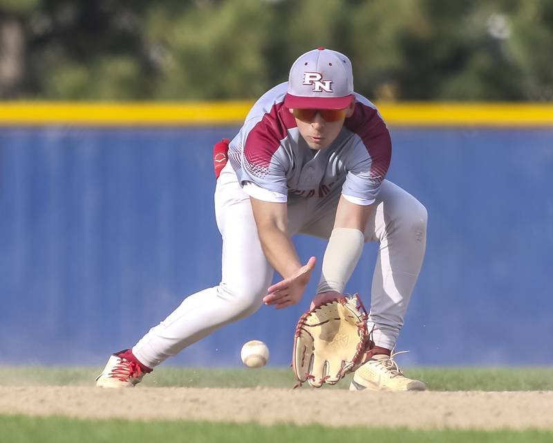 Plainfield North's Mateo Tristan (1) fields a grounder during baseball game between Plainfield North at Oswego East, Monday, April 28, 2025 in Oswego.