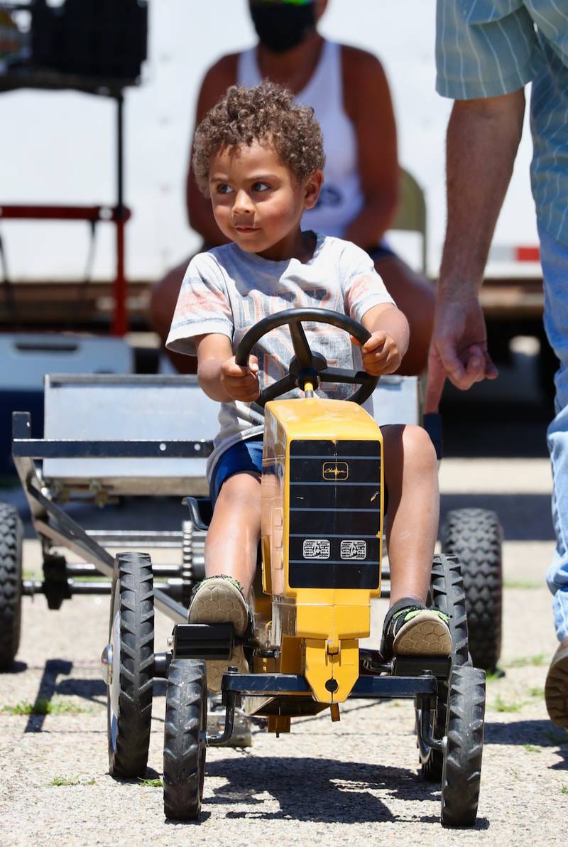 Kids were able to drive around individual tractors during Beef and Ag Days.