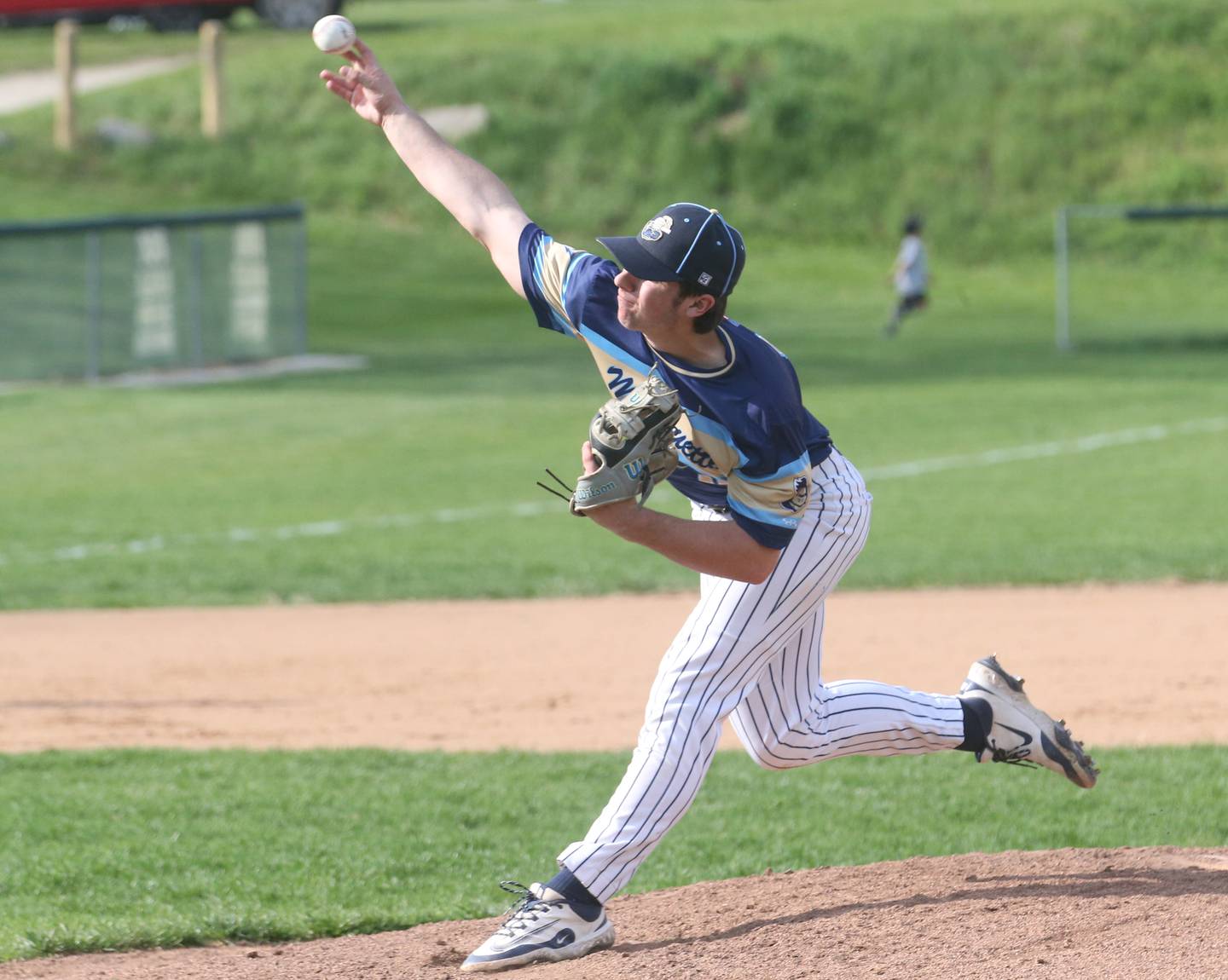 Marquette pitcher Alec Novotney lets go of a pitch to St. Bede on Thursday, April 24, 2025 at St. Bede Academy.