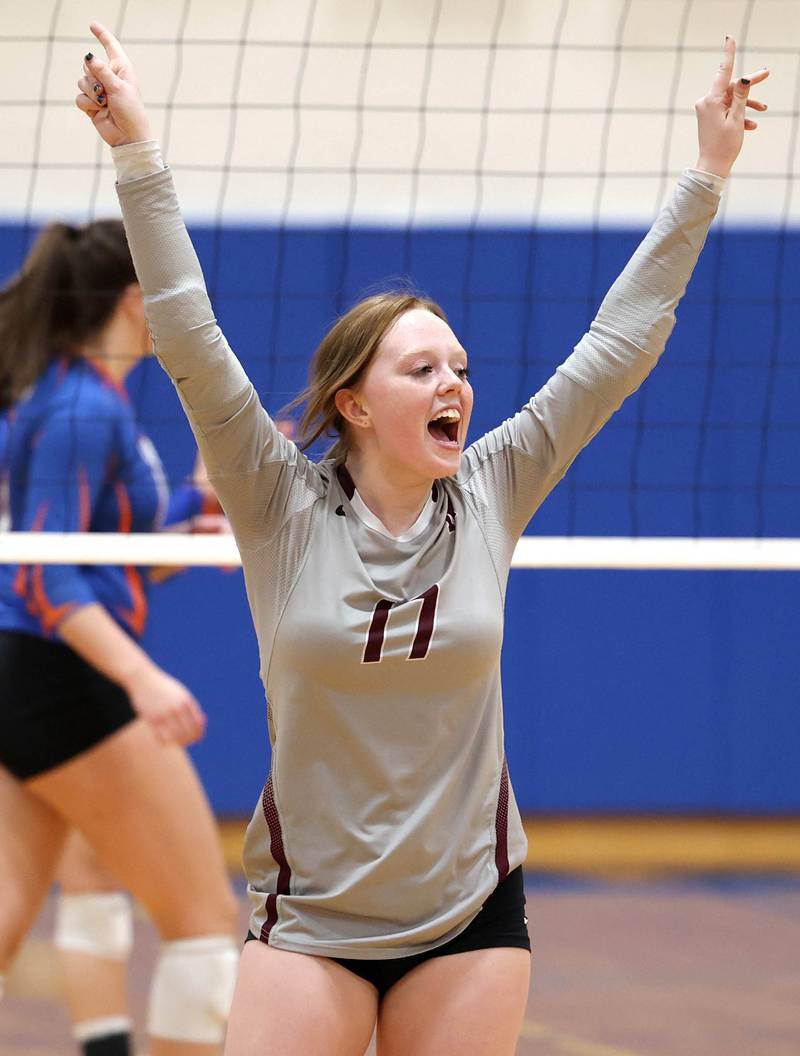 Marengo’s Kayla Klaassens celebrates a point Thursday, Oct. 27, 2022, during their Class 2A Regional final match against Genoa-Kingston at Rosary High School in Aurora.