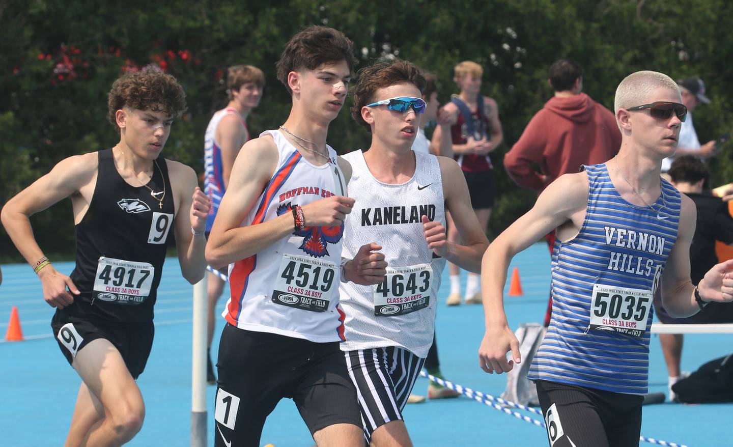 Plainfield's Alex Batsala, Hoffman Estates Brady Faulkner, Kaneland's Carson Kaiser and Vernon Hill's Bryant Lester compete in the 3200 Meter Run during the IHSA Class 3A Boys Track & Field State Finals on Saturday, May 31, 2025 at Eastern Illinois University in Charleston.