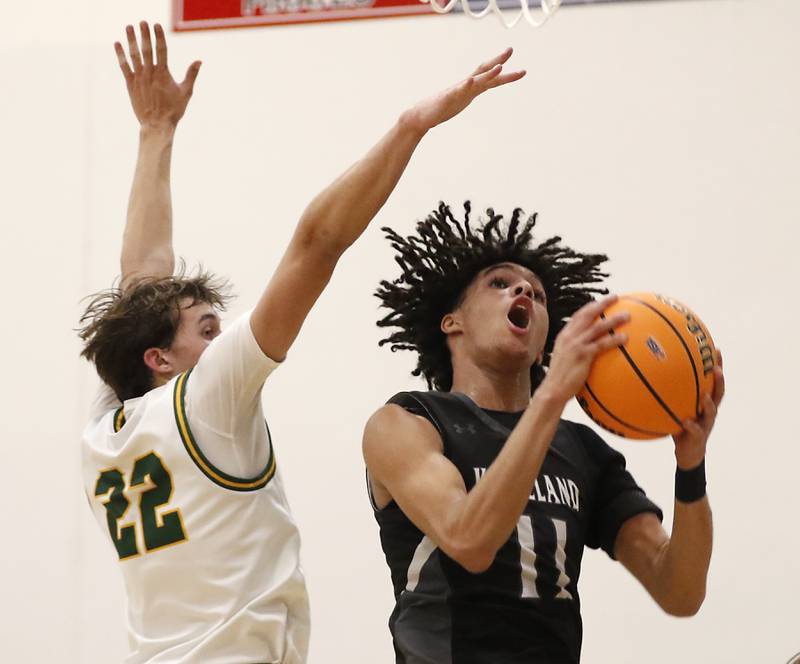 Kaneland's Evan Frieders drives to the basket against Crystal Lake South's Anthony Santarelli during the IHSA Class 3A Rochelle Sectional championship basketball game on Friday, March 7, 2025, at Rochelle High School.