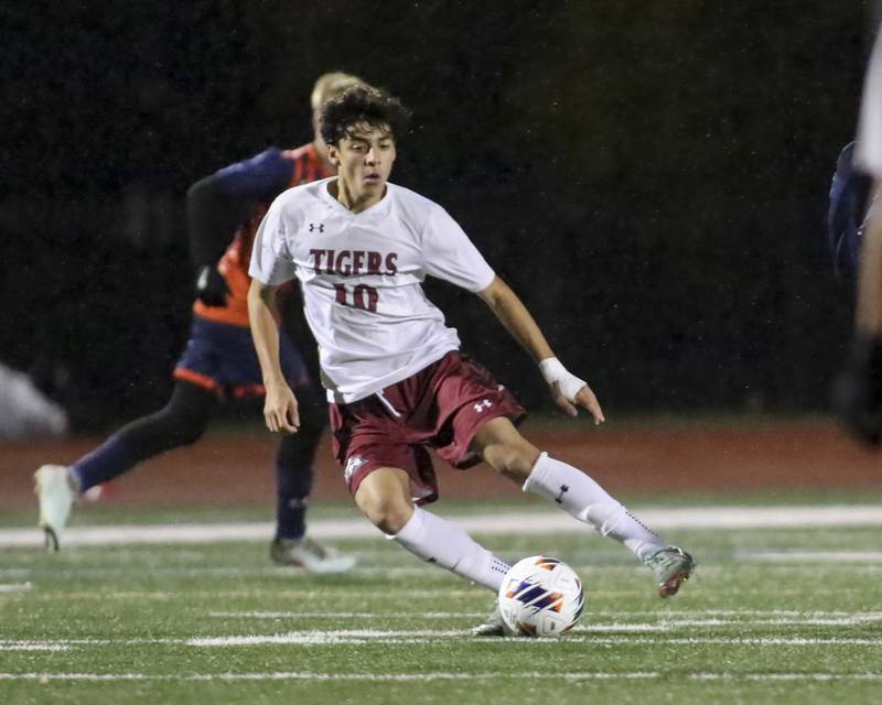 Plainfield North's Luis Sanchez (10) dribbles the ball during Class 3A Naperville Central Regional semifinal soccer match between Plainfield North at Oswego, Tuesday Oct 21, 2025.