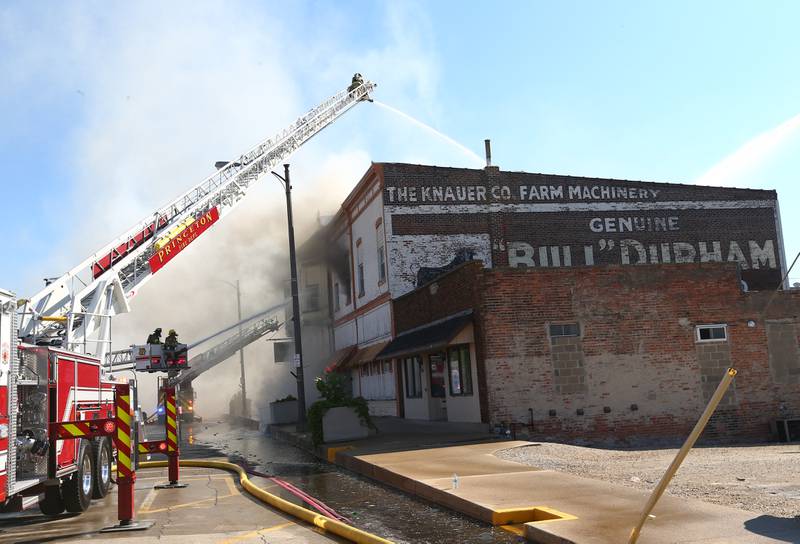 Firefighters work the scene of an apartment fire in the 800 block of Main Street on Monday, Aug. 22, 2022 in Mendota.