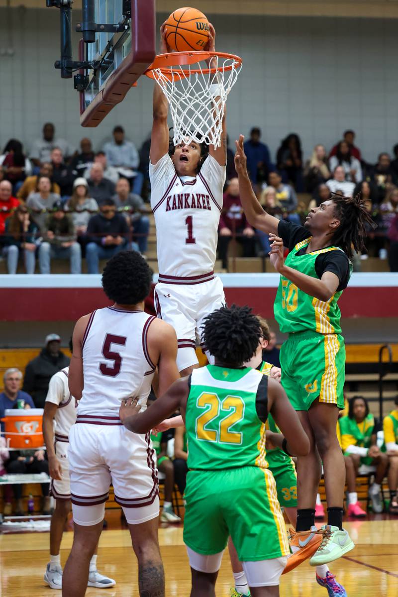 Kankakee's Lincoln Williams jumps for a dunk during the Kays' 83-44 victory over Chicago Ag in the 75th Kankakee Holiday Tournament opening round on Friday, Dec. 26, 2025.