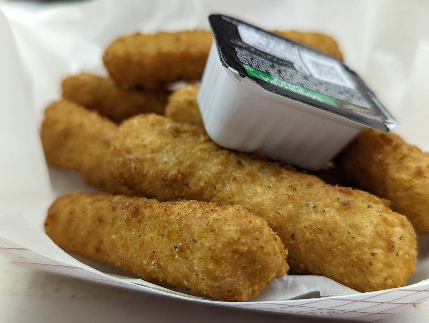 The Knights of Columbus Holy Trinity Council No. 4400 on Joliet's East side offer a choice of four different appetizers at its fish fries, all for $7.95 each: mozzarella sticks with marinara sauce, onion Rings, fried mushrooms and macaroni and cheese bites. Pictured are the cheese sticks.