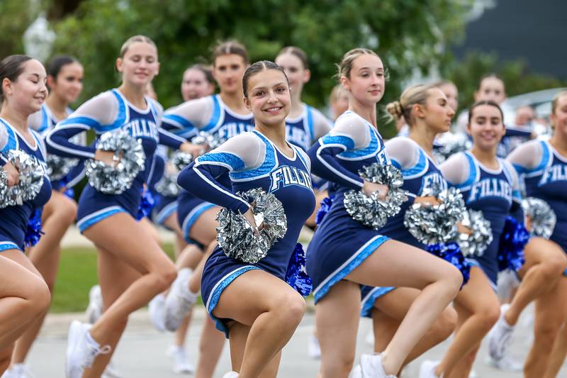 Downers Grove South cheerleaders perform in the Downers Grove South Homecoming Parade. Sept 28, 2024 in Downers Grove.