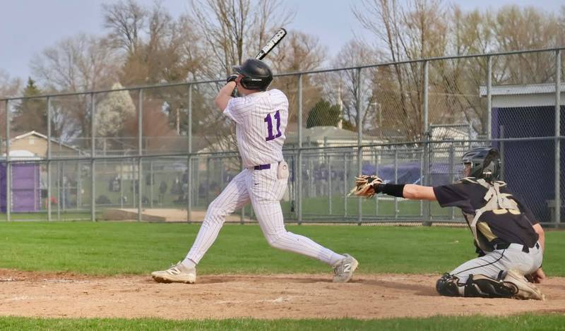 Rochelle's Brody Bruns follows through on his homer during the Hubs' game with Sycamore on April 13.