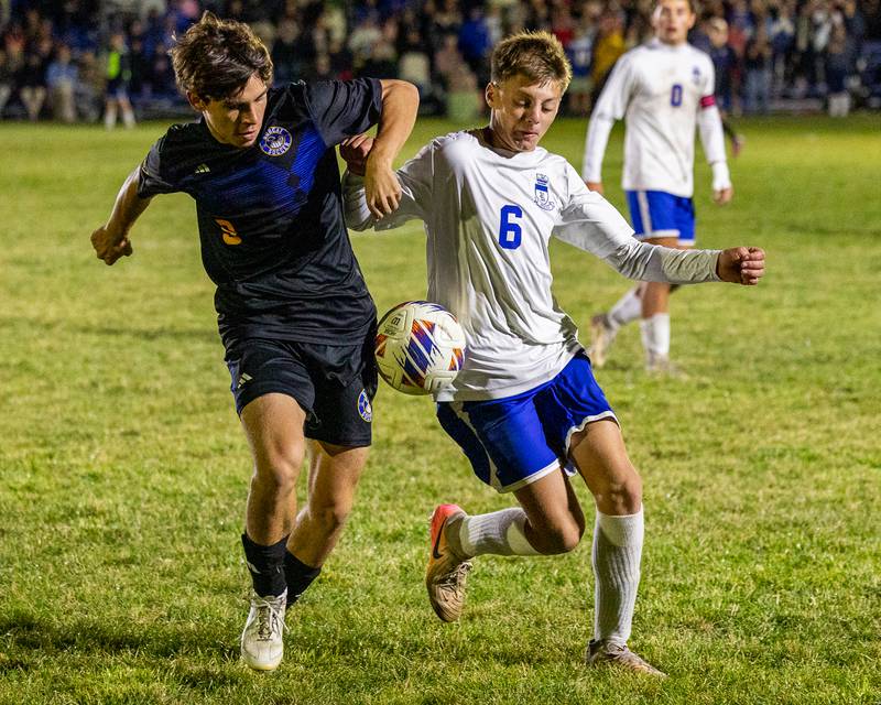 (9) of Somonauk/Leland/Newark pushes away Adam Ness (6) of Hinckley-Big Rock as they fight over possession of ball during the Little Ten Conference Championship match on Thursday, Oct. 9, 2025 at Hinckley-Big Rock School in Hinckley.