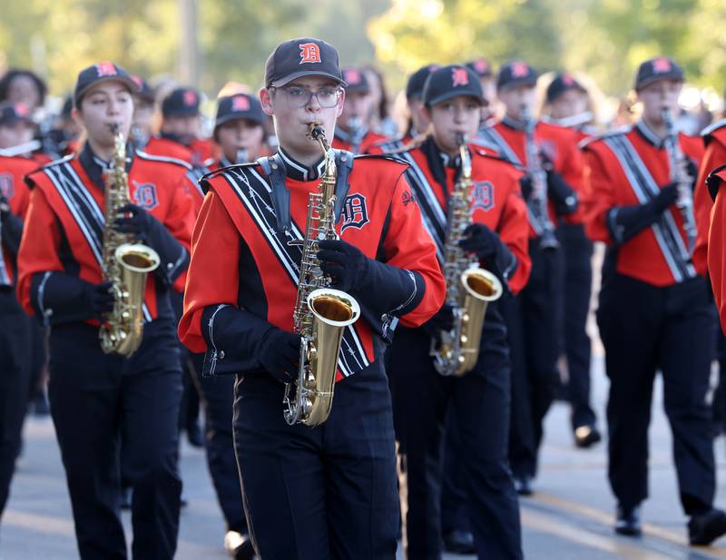 The DeKalb High School marching band heads down West Dresser Road Wednesday, Oct. 2, 2024, during the DeKalb homecoming parade.