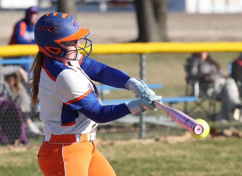 Genoa-Kingston's Kaylee Luepkes makes contact Monday, March 23, 2026, during their game at Hinckley-Big Rock High School.