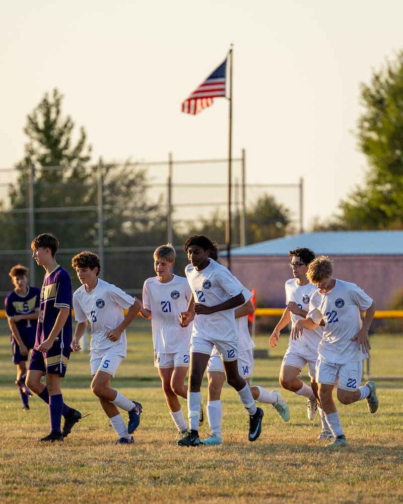 Players of Somonauk/Leland/Newark run together after Jackson Brockway (12) scores goal on Monday, Sept. 29, 2025, at Serena High School in Serena.