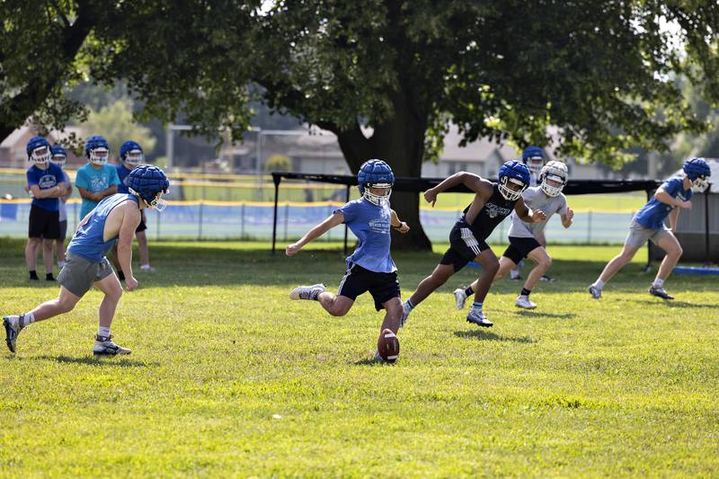 Newman players practice special team drills Tuesday, August 12, 2025, at the high school. The team is gearing up for the 2025 season.