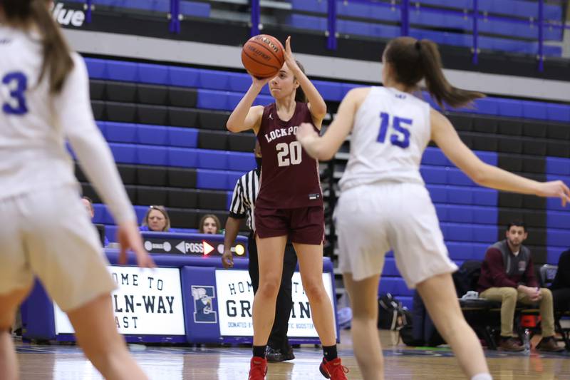 Lockport’s Paige Rannells puts up a three point shot against Lincoln-Way East in the Class 4A Lincoln-Way East Regional semifinal. Monday, Feb. 14, 2022, in Frankfort.