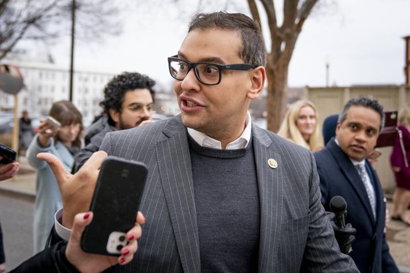 FILE - Rep. George Santos, R-N.Y., leaves a House GOP conference meeting on Capitol Hill in Washington, Jan. 25, 2023.  (AP Photo/Andrew Harnik, File)
