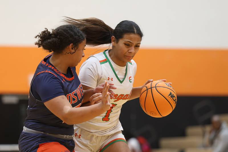 Plainfield East’s Khloe Oglesby battles to the basket against Oswego on Tuesday, Jan. 13, 2026 in Plainfield.