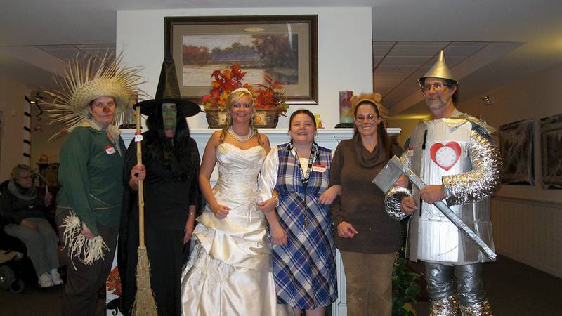 The department heads at the Grand Victorian dressed as characters from "The Wizard of Oz" for the retirement center's first Halloween party on Oct. 17. From left, assistant executive director Rayna Bennett, executive director Kim Tokes, dining service director Lisa Gayden, activities director Mallory Callahan, and maintenance director Rob Paulson.