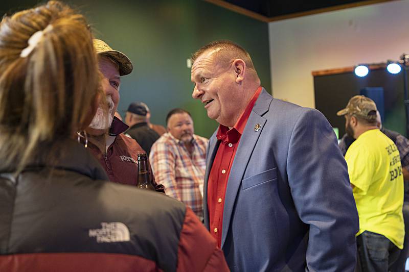 Whiteside County sheriff John Booker works the room Tuesday, Nov. 8, 2022 at Kaddy’s Kitchen and Clubhouse during an election party.