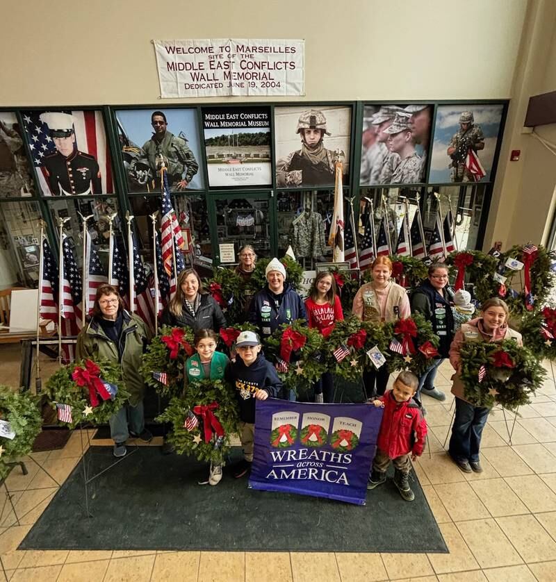 The Marseilles Girl Scout Troop 1667 and Cub Scout Troop 3799 helped prepare wreaths Saturday, Dec. 14, 2024, for the Wreaths Across America ceremony in Marseilles.