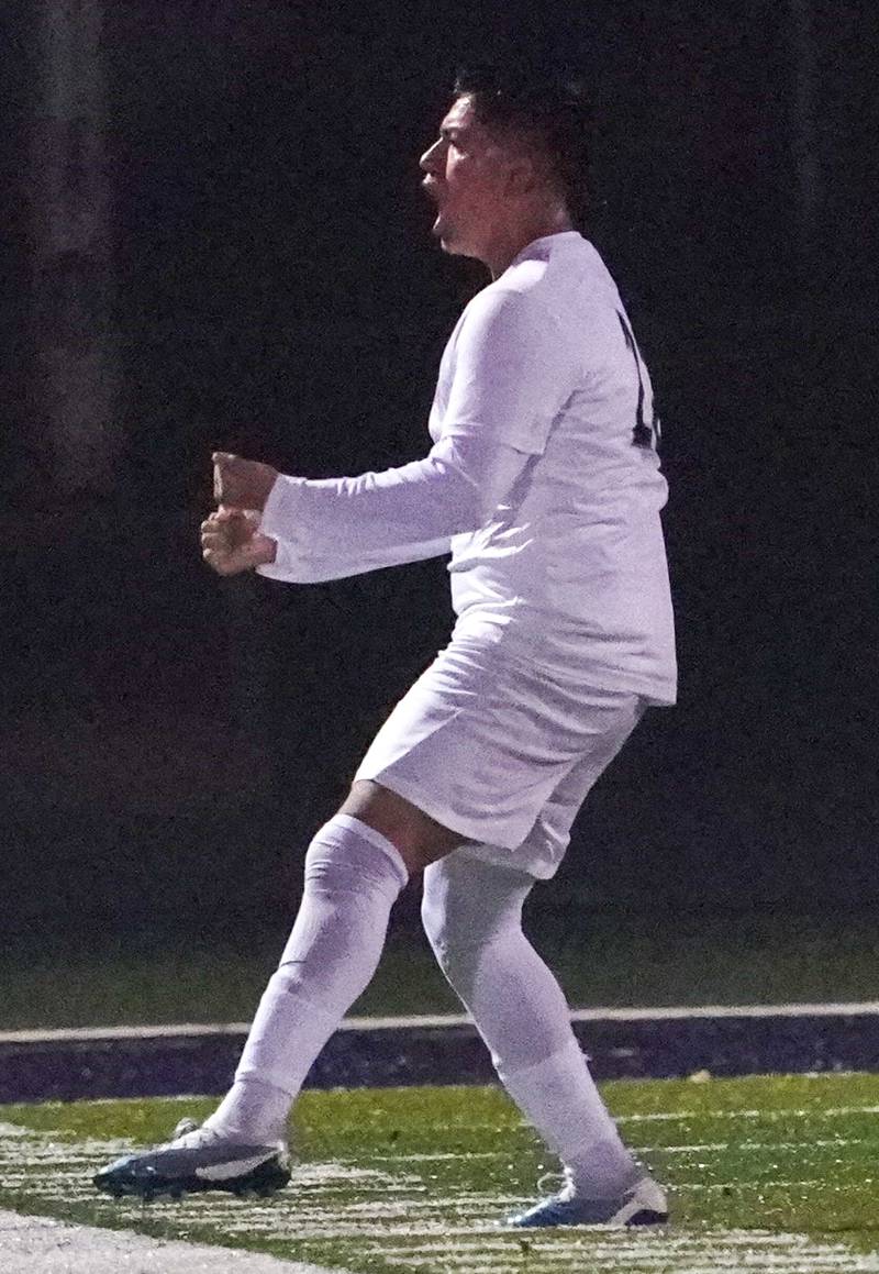 West Chicago's Camilo Salinas (22) reacts after scoring a goal against St. Charles East during a class 3A sectional semifinal soccer match at West Chicago High School on Wednesday, Oct. 25, 2023.