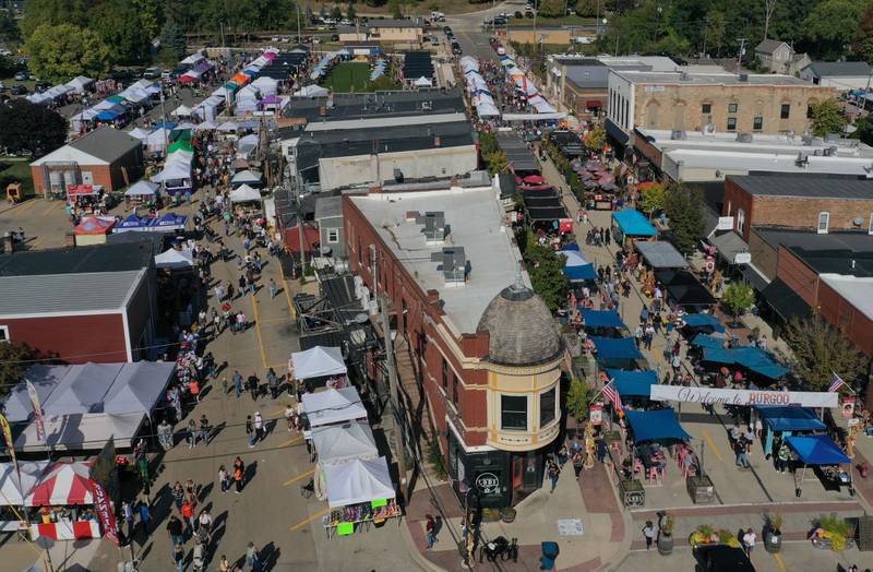 An aerial view of the crowd at the corner of Mill Street and Canal Street during the 55th annual Burgoo Festival on Sunday, Oct. 12, 2025 in Utica.