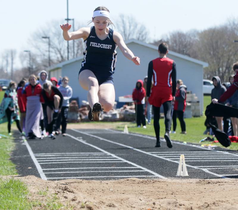 Fieldcrest's Angel Serna does the long jump during the Rollie Morris Invite on Saturday, April 16, 2022 at Hall High School in Spring Valley.