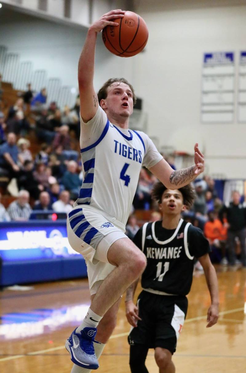 Princeton's Korte Lawson drives for a second-half layup Tuesday night at Prouty Gym. The Tigers won 61-55.