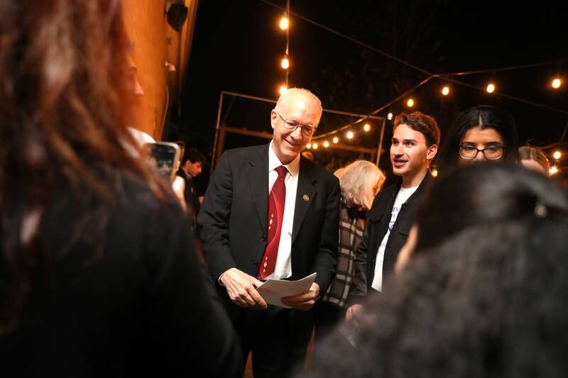 U.S. Congressman Bill Foster, running for re-election against challenger Catalina Lauf, is greeted by supporters at Global Brew Taphouse in St. Charles on Tuesday, Nov. 8. 2022.