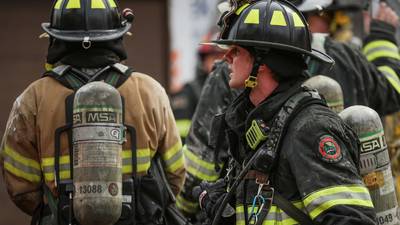 Photos: Firefighter sent to hospital following Algonquin house fire