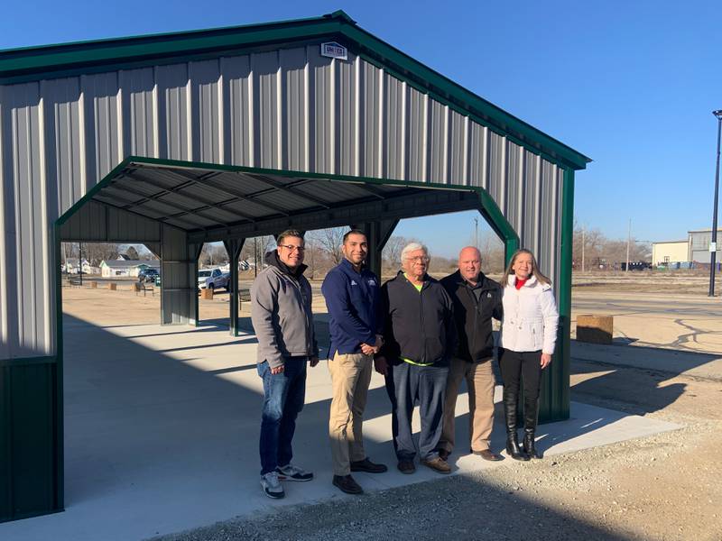 United Metal Buildings of Sterling-Rock Falls donated a new pavilion for Firehouse Ministries and the Rock Falls Farmers Market at 403 W. Second St. in Rock Falls. Pictured are Jaime Cendajas, outside sales representative of United Metal Buildings; Juan Moreno, general manager of United Metal Buildings; Rock Falls Mayor Rod Kleckler; and Brian and Elizabeth Tribley of Firehouse Ministries.