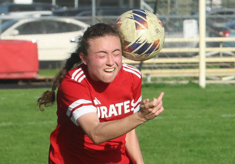 Ottawa's Kindley Moore puts a header on the ball on Wednesday, April 22, 2026 on King Field at Ottawa High School.